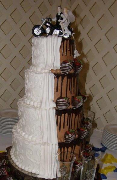vanilla and chocolate wedding cake with chocolate covered strawberries