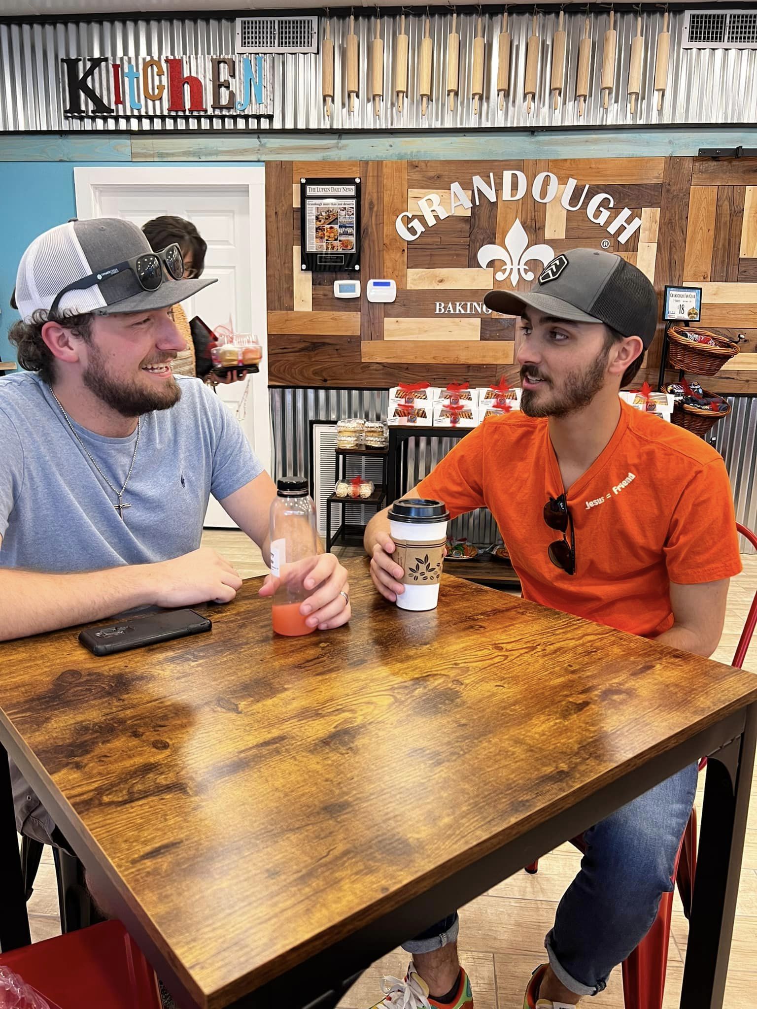 two customers drinking coffee at Grandough Baking Co
