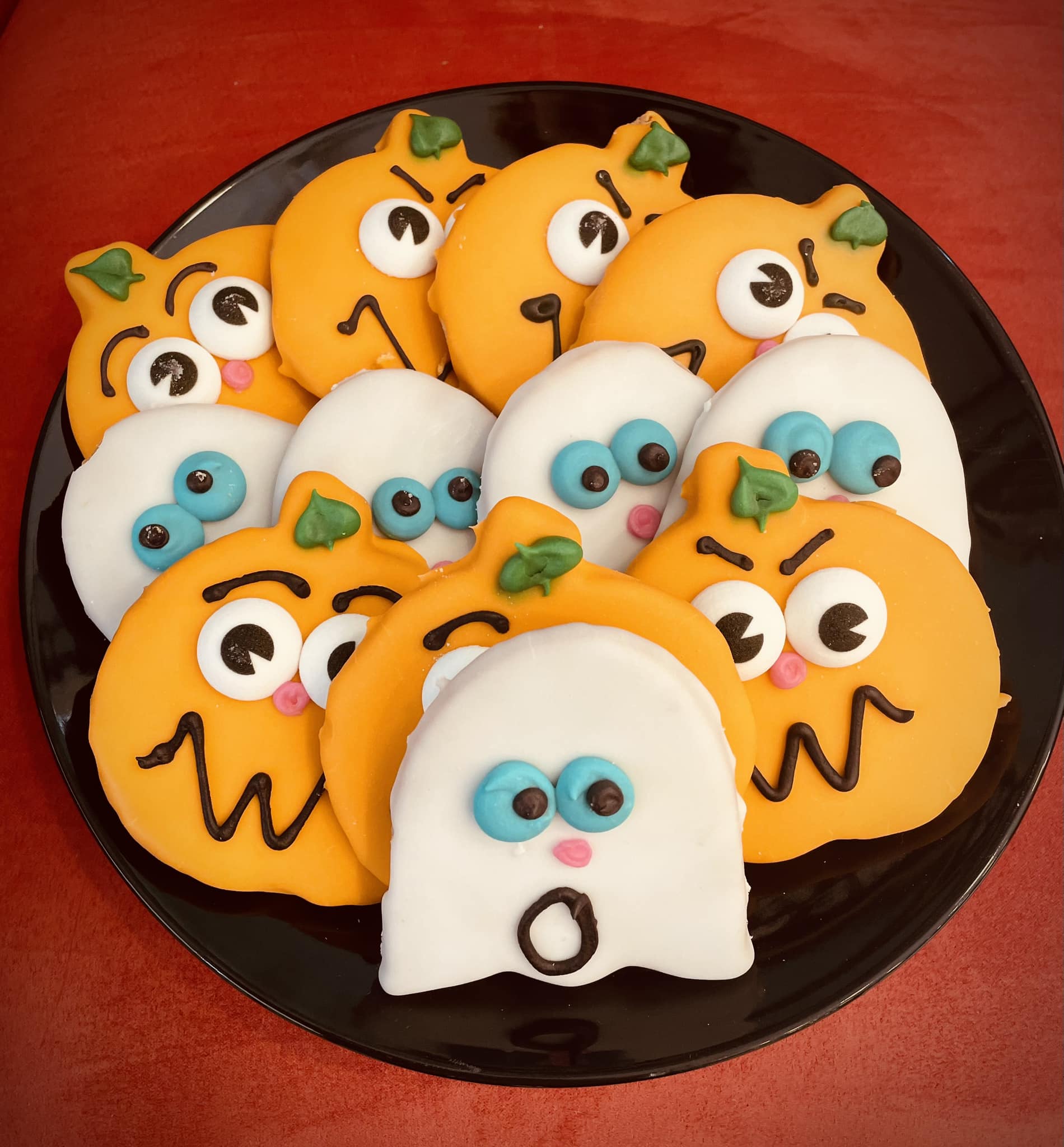 decorated Halloween ghost and pumpkin cookies
