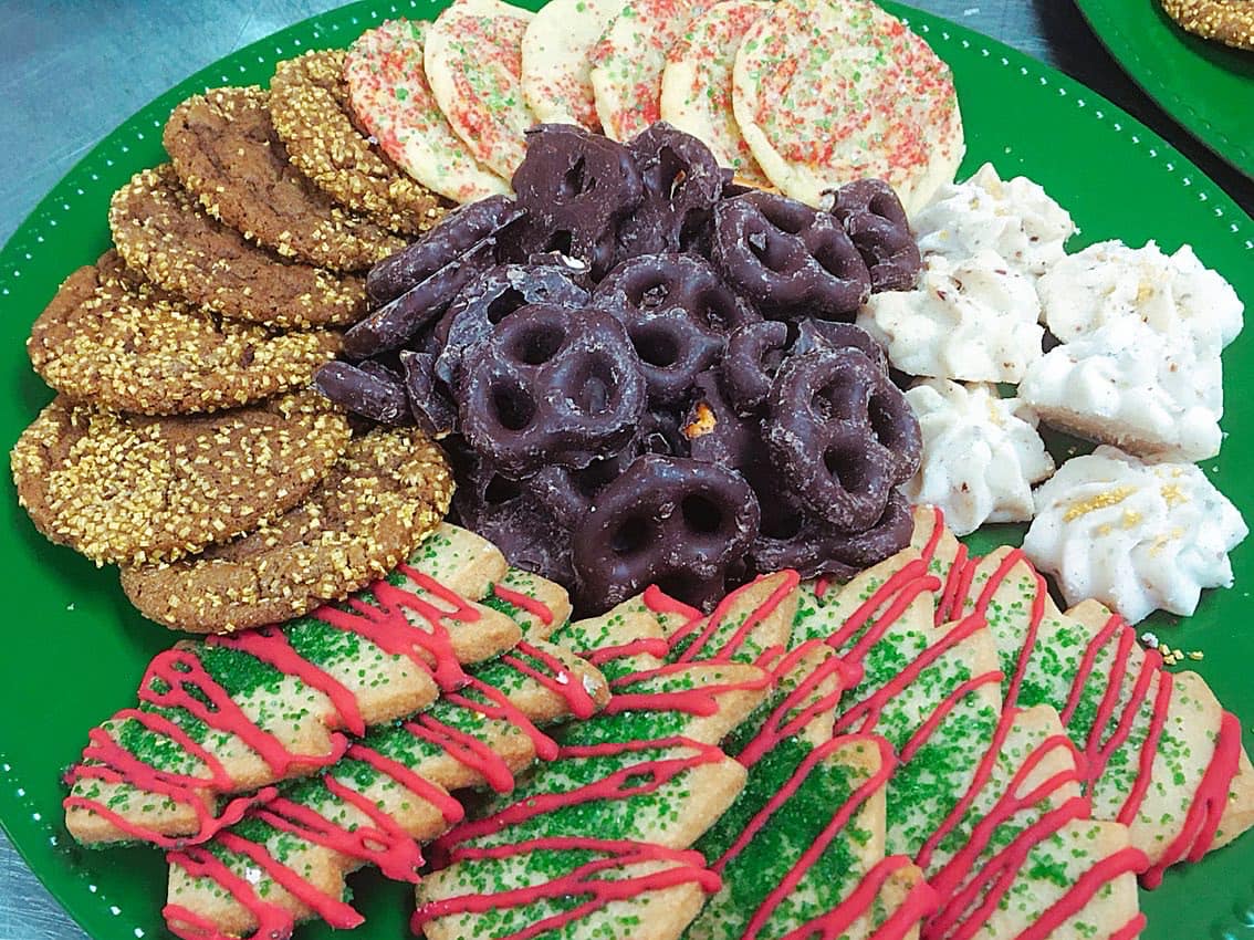 assorted Christmas cookies and sweets on plate