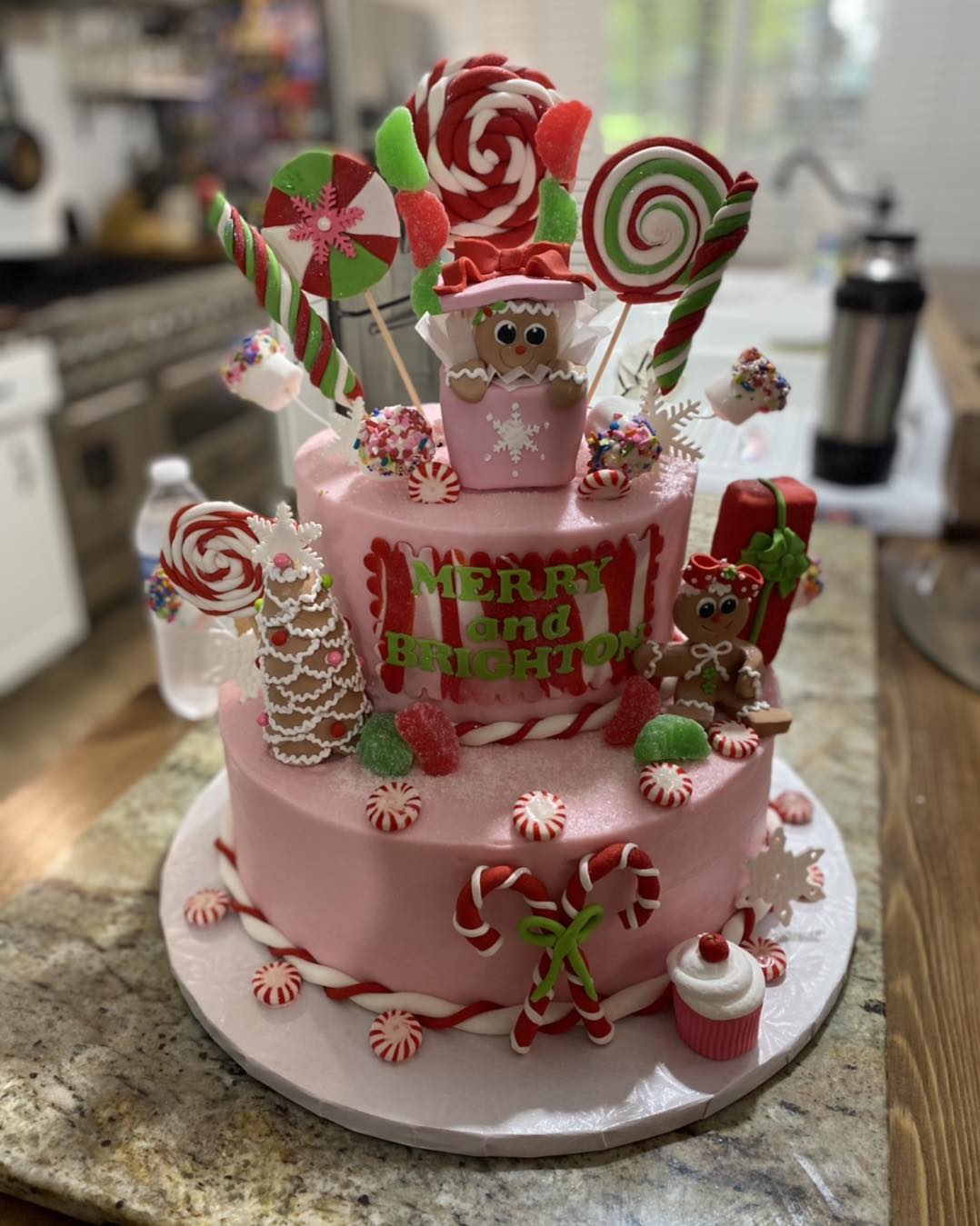 pink Christmas cake with peppermint decor